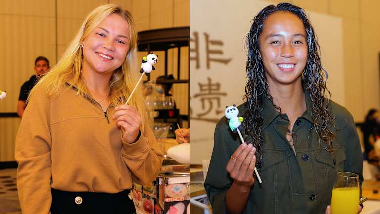 Before their first-round match, Diana Shnaider and Leylah Fernandez pose with some panda-shaped treats.