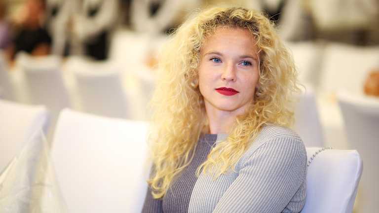 Katerina Siniakova rocks a red lip at the Wuhan player party.